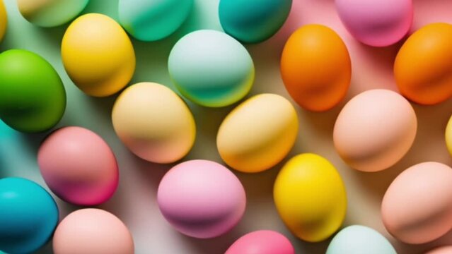 Assortment of painted Easter eggs in soft pastel shades, artistically placed on gradient pastel backdrop, ideal for festive springtime imagery