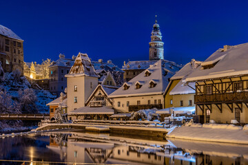 View of Czech Krumlov in winter, Czech Republic. Picturesque houses under the castle with...