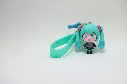 Hatsune Miku character keychain. Virtual singer with vocaloid. Japanese manga and anime style doll. 