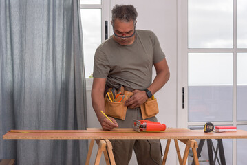 carpenter at work  using a pencil