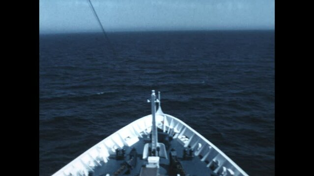 Cruise Ship Bow 1974 - The bow of a ship is seen from a cruise ship as it sails in the Pacific Ocean in 1974.