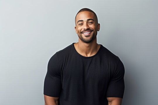 Handsome african american man smiling and looking at camera