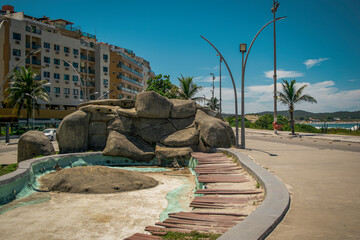 Beautiful square with buildings in the background and well decorated with stones on the edge of Cabo Frio beach, Rio de Janeiro.