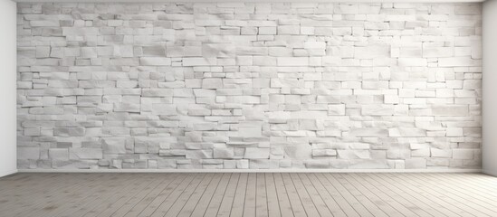 A room with a white brick wall and white wood floor stands empty, devoid of any furniture or decorations. The simplicity of the design enhances the spaciousness and cleanliness of the room.