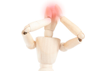 Headache on a wooden mannequin. Representation of migraine pain. Articulated figure grabs his head.