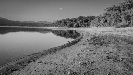 Black and white, overlooking the freshwater beach of the Várzea das Flores dam, in Contagem, Minas Gerais, Brazil.