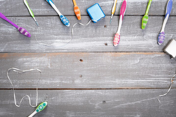Colorful toothbrush, gum brush, and dental floss background.  Dental health, care, hygiene...
