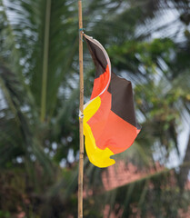 Germany flag flying in wind on Bentota Beach, southern Sri Lanka