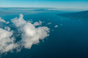The West Maui Mountains, West Maui Volcano, or Mauna Kahālāwai which means "holding house of water, is approximately 1.7 million years old and forms a much eroded shield volcano.