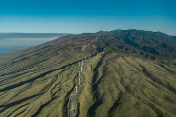 The West Maui Mountains, West Maui Volcano, or Mauna Kahālāwai which means "holding house of water, is approximately 1.7 million years old and forms a much eroded shield volcano. Kaheawa Wind Power
