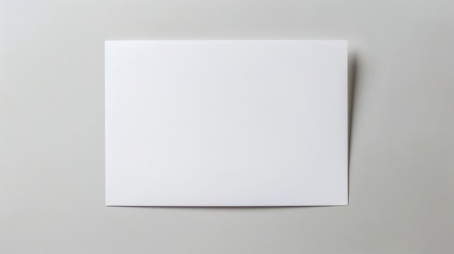 Minimalist White Paper Sheet on Gray Background Stock Image