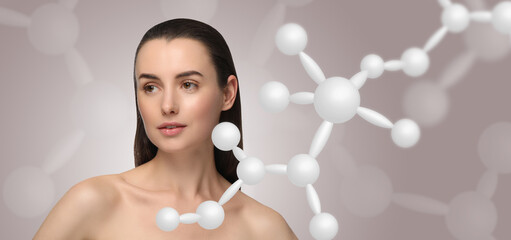 Beautiful woman with perfect healthy skin and molecular model on grey background, banner design....
