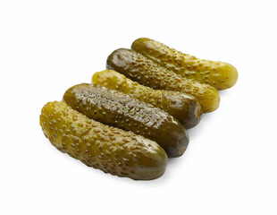 Many tasty pickled cucumbers isolated on white