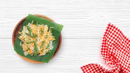 Selective focus Urap Sayur is Indonesian traditional food. a salad dish of steamed various...