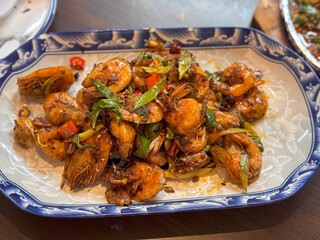 stir fried spicy prawns in plate