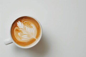 Perfectly brewed cup of latte on a clean white surface Showcasing the art of coffee making