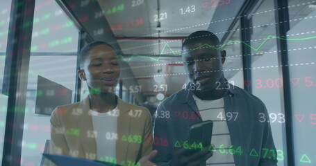 Image of financial data processing over diverse businesspeople working in office