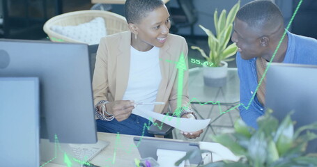 Image of financial data processing over diverse businesspeople working in office