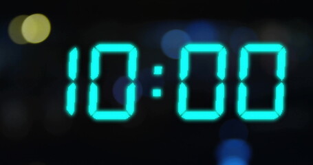 Image of blue digital clock timer changing on black background