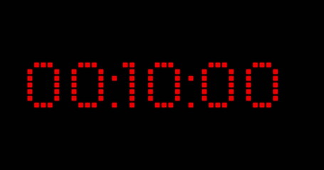 Image of red digital timer changing on black background