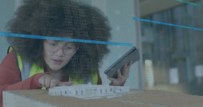 Image of financial data processing over biracial woman checking 3d model in office