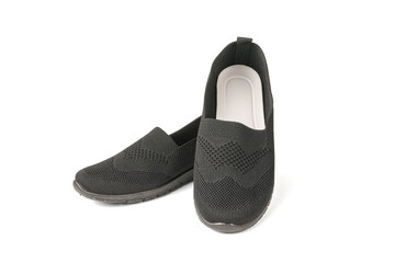 Women's shoes with white insoles and black soles isolated on a white background.