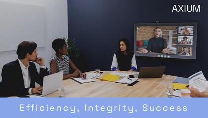Composite of efficiency, integrity, success text over diverse businesspeople in office
