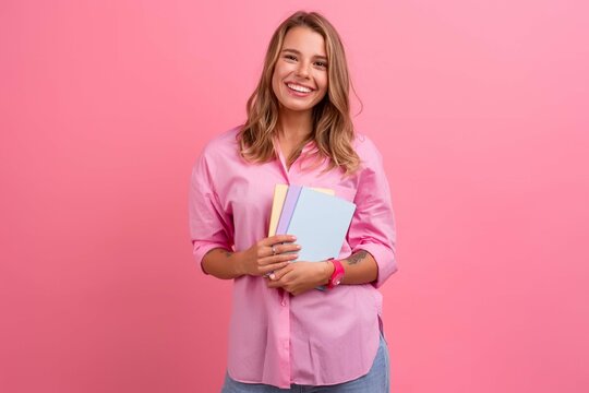 Blond Pretty Woman Pink Shirt Smiling Holding Holding Notebooks