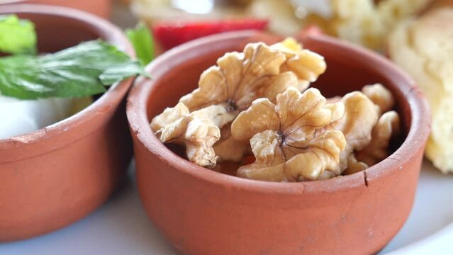 walnut on a plate on table 