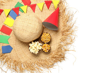 Bowls with corn, party cone, flags and straw hat on white background. Festa Junina (June Festival) celebration
