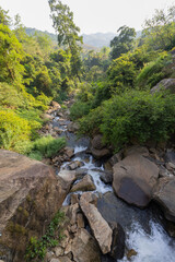 Fototapeta na wymiar Stream of water from Diyaluma waterfall in Ella, Badulla District of Uva Province, Sri Lanka