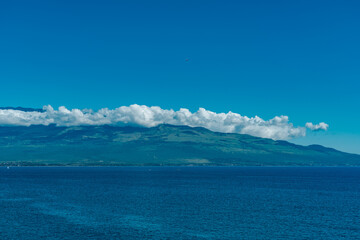 Papawai Scenic Lookout.  Honoapiilani Highway, Wesrt Maui, Hawaii. Haleakalā , or the East Maui Volcano, is a massive, active shield volcano that forms more than 75% of the Hawaiian Island of Maui. 
