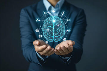 Businessman holding a symbolic brain and digital marketing icon, representing business growth strategy and target goals - Powered by Adobe