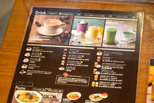 Tokyo, Japan, November 4 2023: Menu board with various drinks and prices in a Japanese cafe.