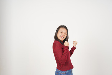 Young Asian woman in Red t-shirt doing yes excited or celebration gesture isolated on white background