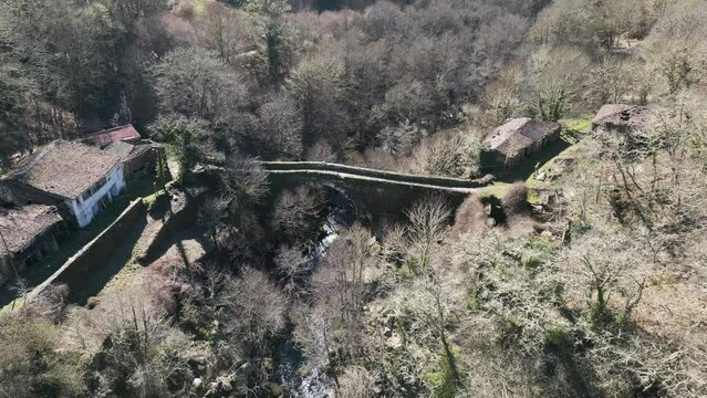 Panoramic aerial orbit above Navea Bridge in Ourense Galicia Spain