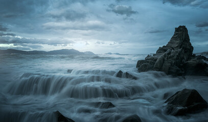 Azkorri beach in Getxo at sunset on a cloudy day with cold tones