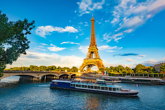 Scenic panorama of Eiffel Tower, Seine River, and pont d'lena in Paris, France