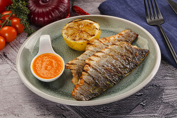 Grilled seabass fillet with lemon