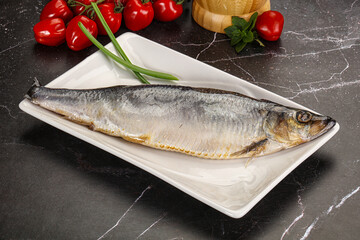 Whole raw salted herring fish