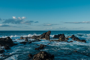 Hookipa Lookout, Paia Maui Hawaii.  Waves Crashing Against Basalt Rocks.