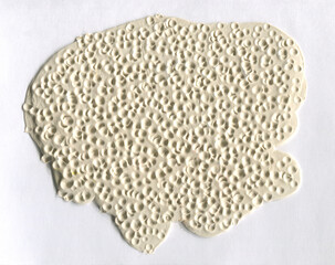 White plasticine texture. Champagne coloured playdough textured background. Abstract modelling clay backdrop. Cream coloured web banner, handmade poster design or label design elements.