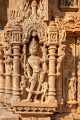 Fototapeta na wymiar Ancient bas-relief of famous Neminath Jain temple in Ranakpur, Rajasthan, India