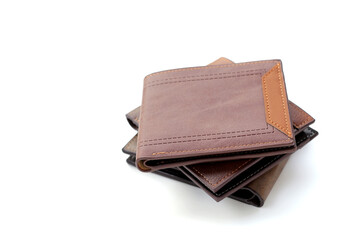 Brown wallets on white background.