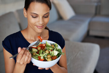 Black woman, smile and salad for eating, food and health on sofa, couch and lounge at home, house...