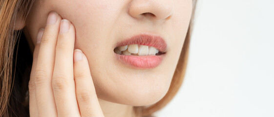 Asian woman feel toothache from gingivitis, female suffer tooth, decay problems, dental care....
