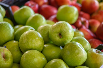 Green and red apples for sale in a market 1