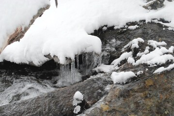 icicles over a mountain stream
