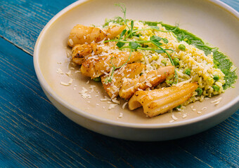 squids or octopus risotto with pesto sauce