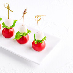 mozzarella with cherry tomatoes on a skewer